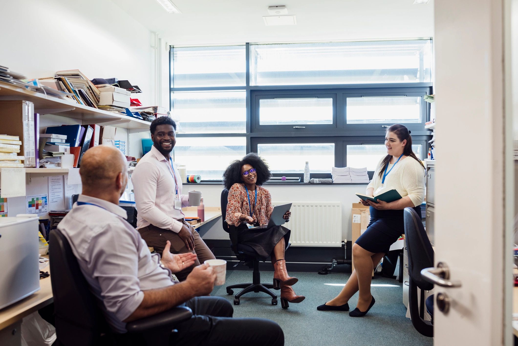 Professional team in an office discussing work